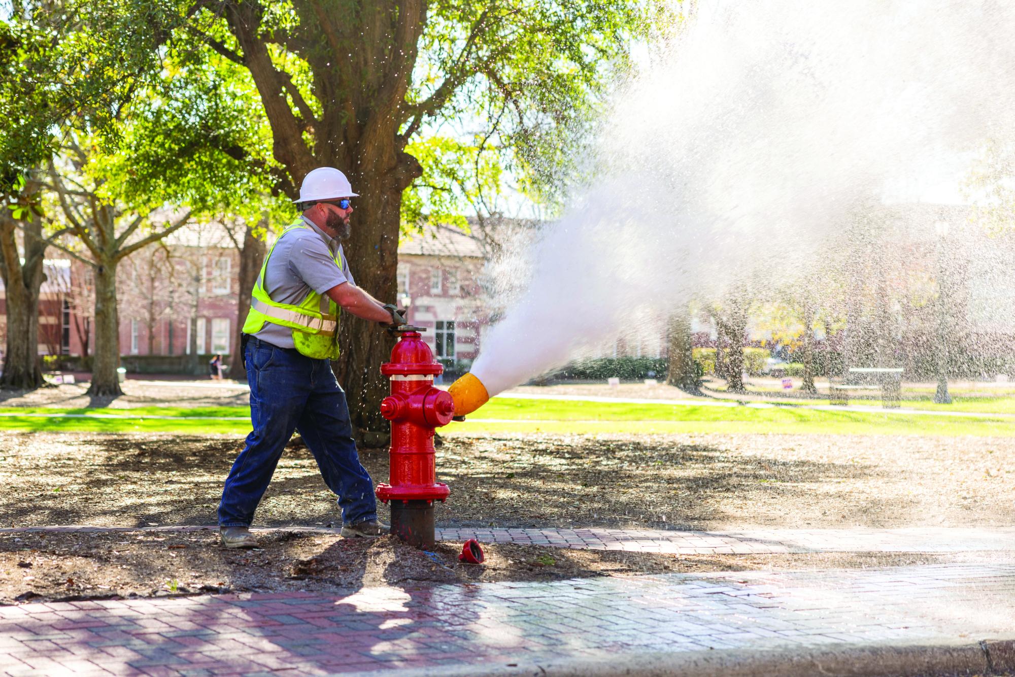 Water Resources employee opens fire hydrant